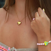Golden necklace trend heart